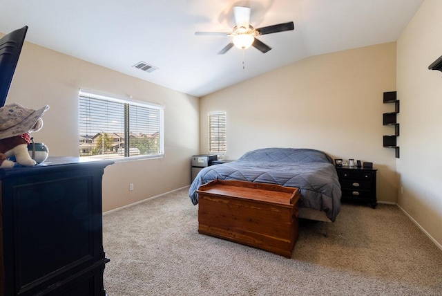 carpeted bedroom featuring ceiling fan and lofted ceiling