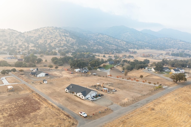 bird's eye view with a mountain view and a rural view