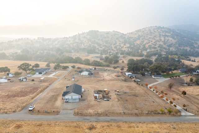 bird's eye view with a mountain view and a rural view