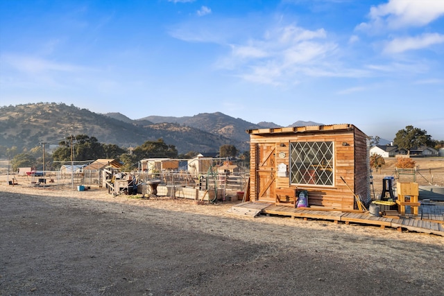 view of front of property with a mountain view