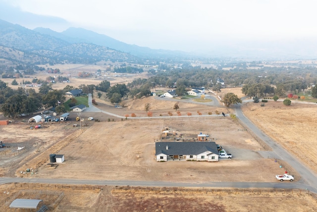 aerial view featuring a mountain view and a rural view