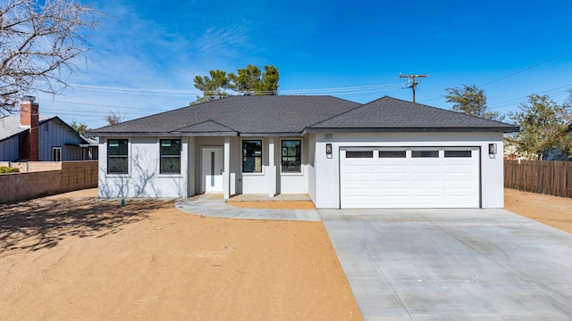 single story home with a garage