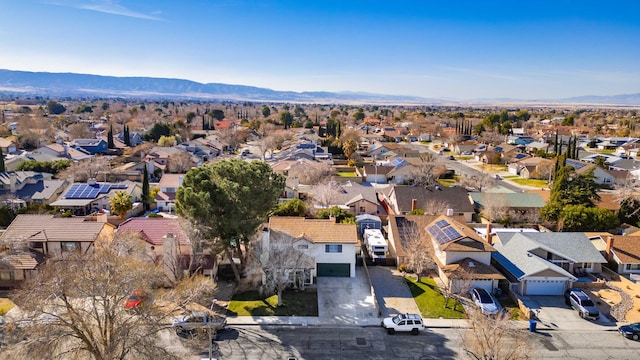 bird's eye view with a mountain view