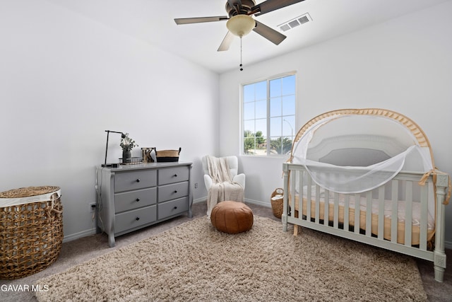 5080 Meadowsweet Dr, Palmdale, CA 93551 - carpeted bedroom featuring a nursery area and ceiling fan