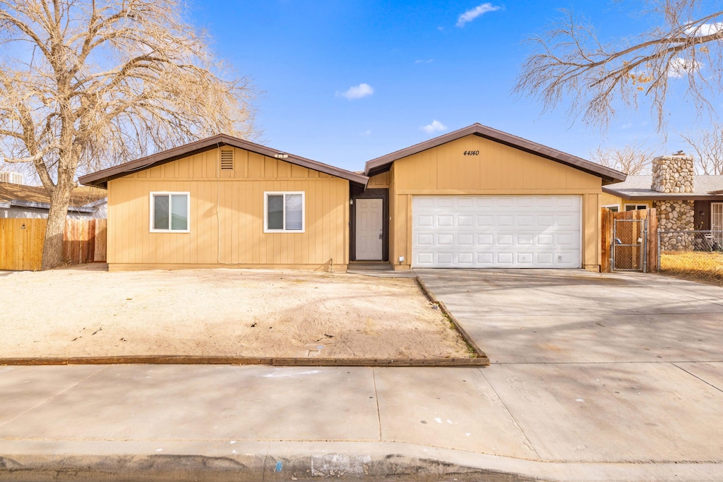 ranch-style house with a garage