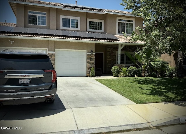 4011 Prestwick Ln, Palmdale, CA 93551 - view of front of home featuring an attached garage, concrete driveway, stucco siding, a front yard, and a tile roof