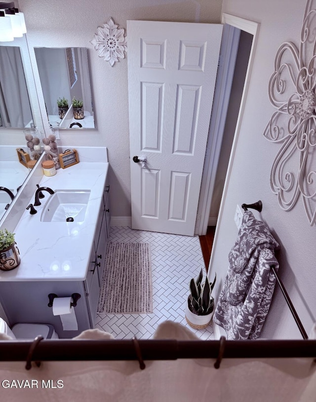 4011 Prestwick Ln, Palmdale, CA 93551 - bathroom with vanity and baseboards
