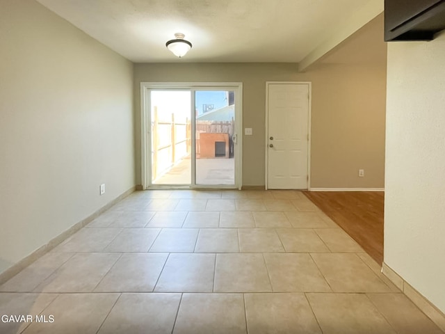 40205 E 162nd St, Palmdale, CA 93591 - unfurnished room featuring baseboards and light tile patterned flooring