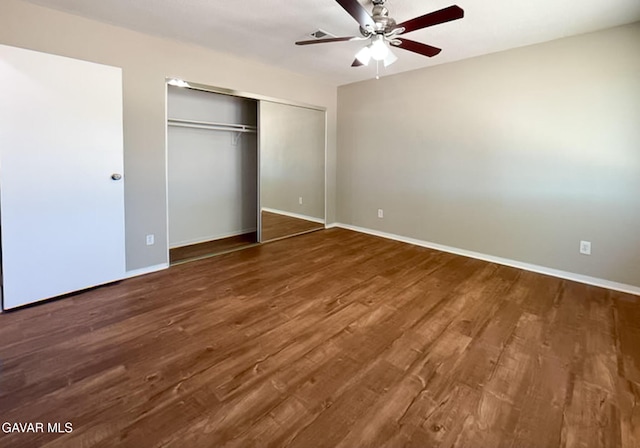 40205 E 162nd St, Palmdale, CA 93591 - unfurnished bedroom featuring wood finished floors, a closet, and a ceiling fan