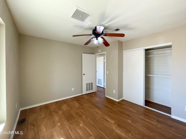 40205 E 162nd St, Palmdale, CA 93591 - unfurnished bedroom with wood finished floors, a closet, and a ceiling fan