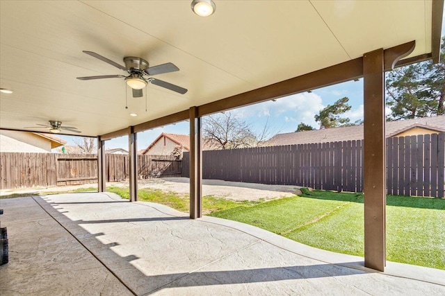 view of patio / terrace with a fenced backyard and ceiling fan