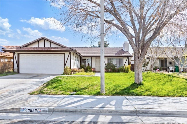 view of front of property featuring a front lawn, concrete driveway, stucco siding, a chimney, and an attached garage