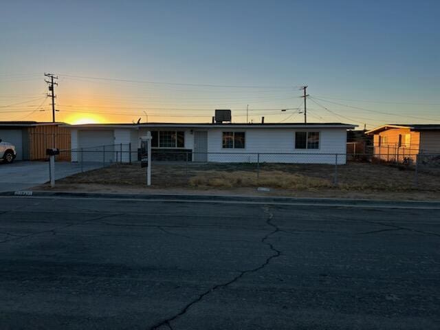 ranch-style home with cooling unit