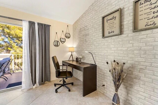 344 Vista Royal Dr, Palm Desert, CA 92211 - tiled office space featuring lofted ceiling and brick wall
