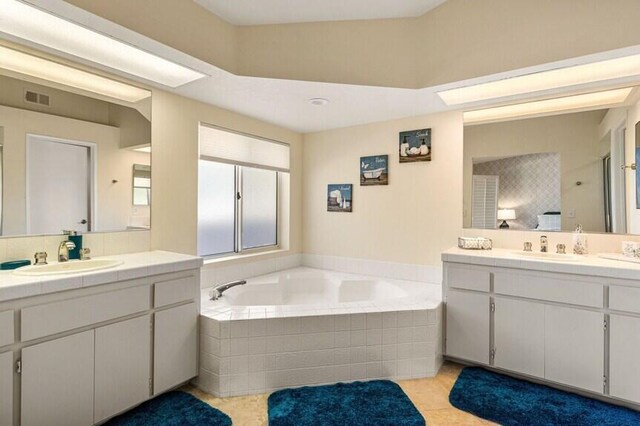 344 Vista Royal Dr, Palm Desert, CA 92211 - full bath with a sink, two vanities, a garden tub, and visible vents