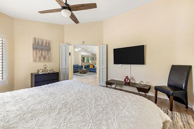 344 Vista Royal Dr, Palm Desert, CA 92211 - bedroom featuring baseboards, ceiling fan, and wood finished floors
