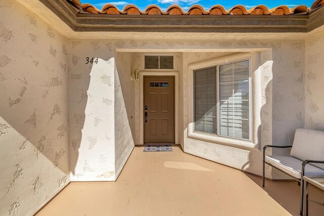344 Vista Royal Dr, Palm Desert, CA 92211 - view of exterior entry featuring stucco siding