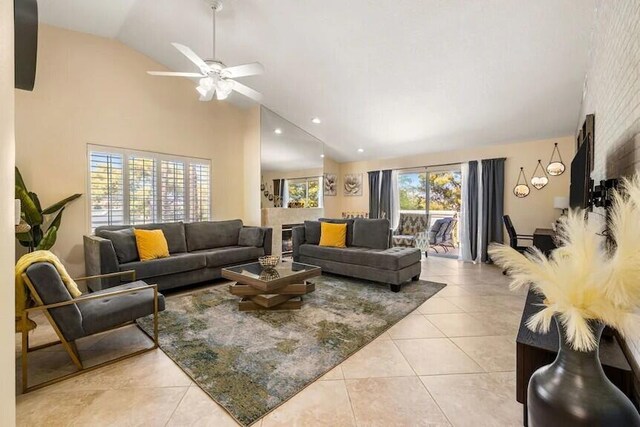 344 Vista Royal Dr, Palm Desert, CA 92211 - living area with light tile patterned floors, high vaulted ceiling, ceiling fan, and recessed lighting