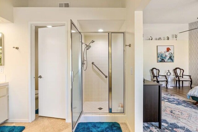 344 Vista Royal Dr, Palm Desert, CA 92211 - full bathroom with visible vents, tile patterned flooring, vanity, baseboards, and a shower stall
