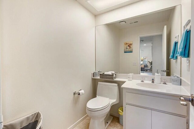 344 Vista Royal Dr, Palm Desert, CA 92211 - half bath with visible vents, baseboards, toilet, and vanity