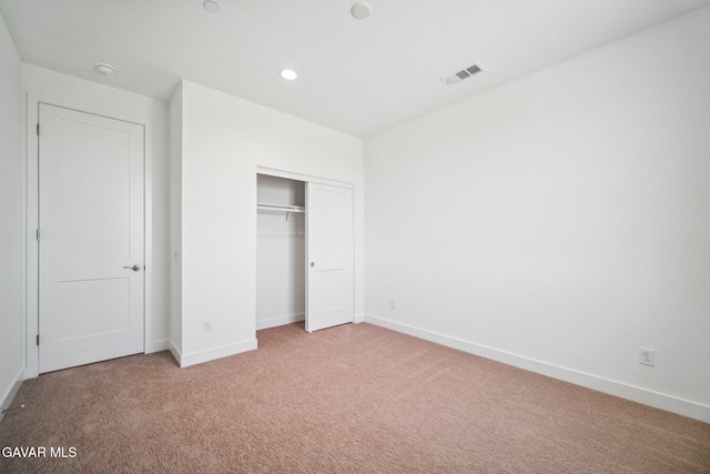39635 Nicholas Ct, Palmdale, CA 93551 - unfurnished bedroom featuring light colored carpet and a closet