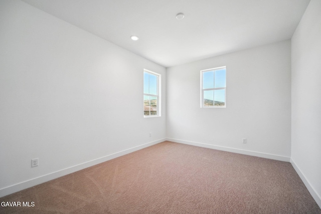 39635 Nicholas Ct, Palmdale, CA 93551 - empty room featuring light colored carpet and recessed lighting
