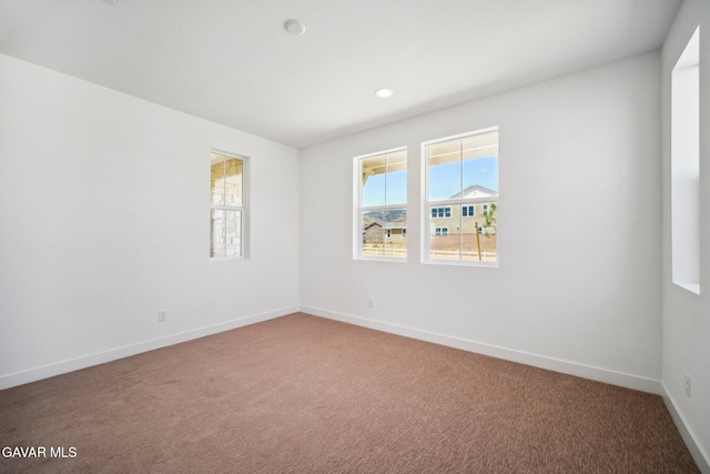 39635 Nicholas Ct, Palmdale, CA 93551 - spare room with light colored carpet and recessed lighting