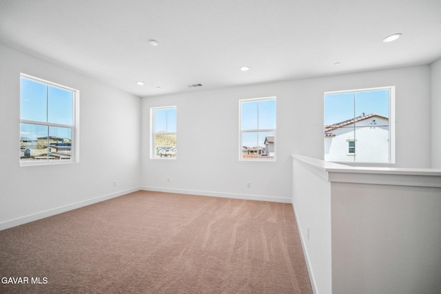 39635 Nicholas Ct, Palmdale, CA 93551 - empty room with light carpet and recessed lighting