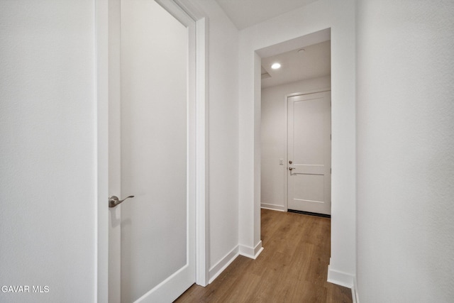 39635 Nicholas Ct, Palmdale, CA 93551 - corridor featuring wood finished floors and recessed lighting