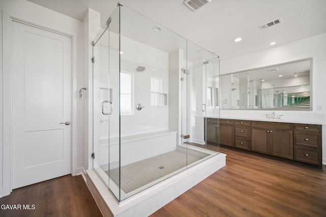 39635 Nicholas Ct, Palmdale, CA 93551 - full bath featuring vanity, wood finished floors, a stall shower, and recessed lighting