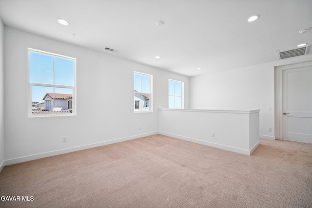39635 Nicholas Ct, Palmdale, CA 93551 - spare room featuring light carpet and recessed lighting