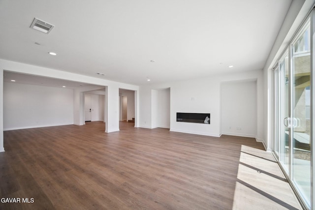 39635 Nicholas Ct, Palmdale, CA 93551 - unfurnished living room featuring wood finished floors, a fireplace, and recessed lighting