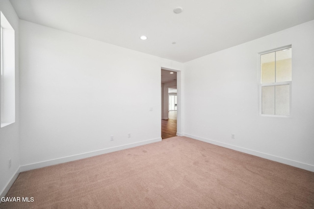 39635 Nicholas Ct, Palmdale, CA 93551 - unfurnished room featuring light colored carpet, plenty of natural light, and recessed lighting