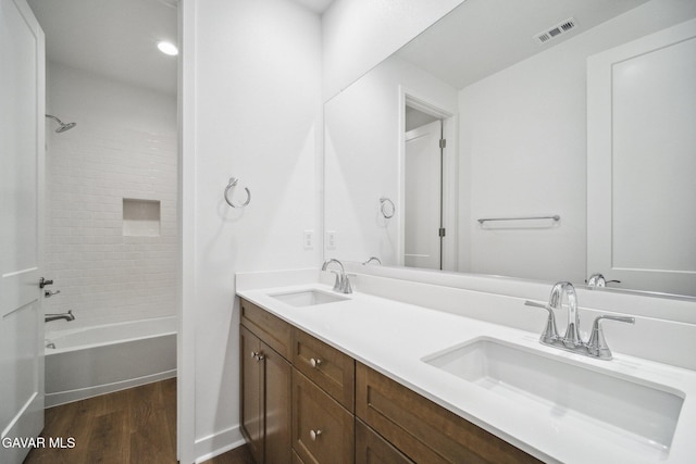 39635 Nicholas Ct, Palmdale, CA 93551 - full bath featuring wood finished floors, double vanity, and shower / tub combination