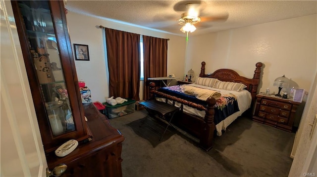 bedroom with ceiling fan, carpet, and a textured ceiling