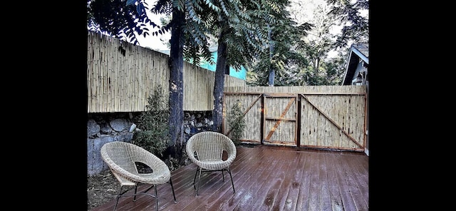 view of patio / terrace featuring a wooden deck