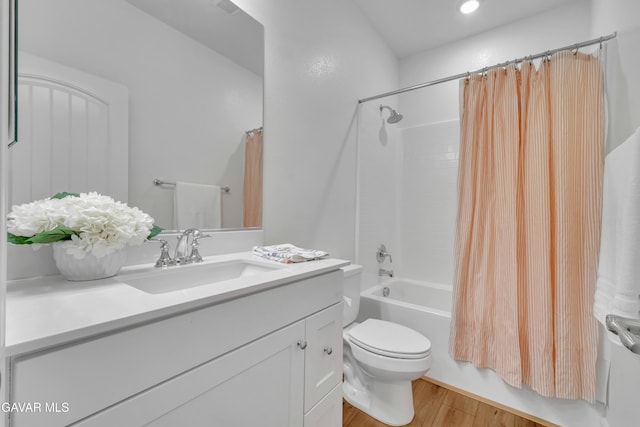 3932 Birchwood Ave, Rosamond, CA 93560 - full bathroom featuring vanity, shower / tub combo, wood finished floors, and recessed lighting