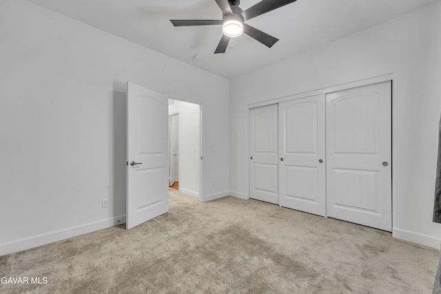 3932 Birchwood Ave, Rosamond, CA 93560 - unfurnished bedroom with carpet, a closet, and a ceiling fan