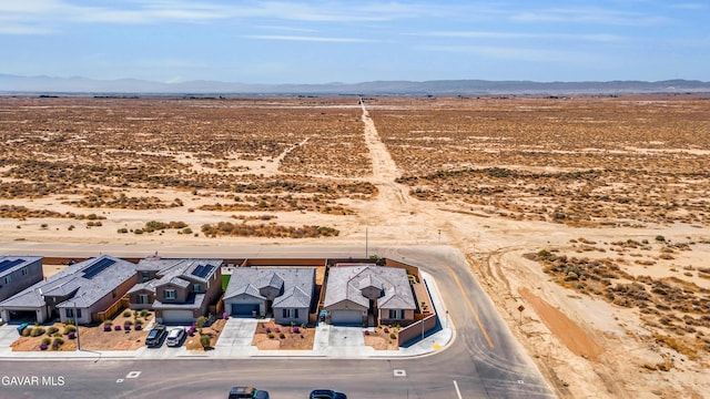 3932 Birchwood Ave, Rosamond, CA 93560 - aerial view of sparsely populated area featuring a mountain backdrop and nearby suburban area