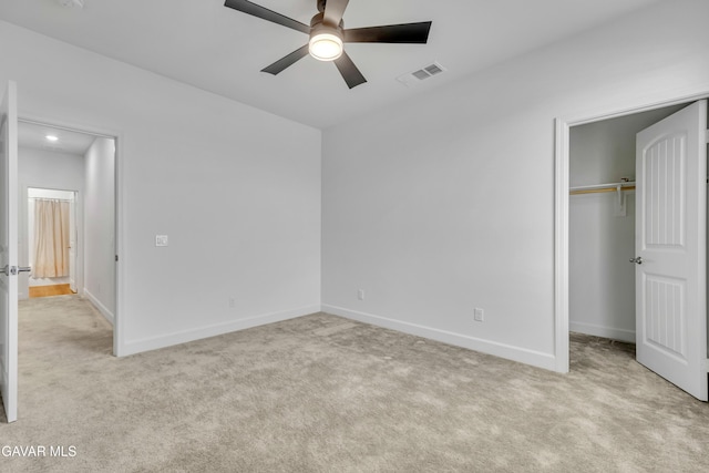 3932 Birchwood Ave, Rosamond, CA 93560 - unfurnished bedroom with carpet flooring, a closet, a ceiling fan, and a spacious closet