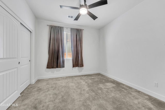 3932 Birchwood Ave, Rosamond, CA 93560 - unfurnished bedroom featuring carpet flooring, a closet, and a ceiling fan