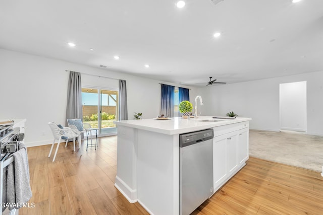 3932 Birchwood Ave, Rosamond, CA 93560 - kitchen with stainless steel appliances, open floor plan, a ceiling fan, a center island with sink, and recessed lighting