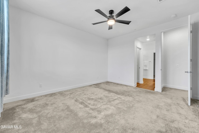 3932 Birchwood Ave, Rosamond, CA 93560 - unfurnished bedroom with carpet floors and a ceiling fan