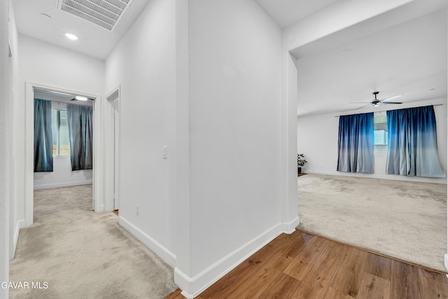 3932 Birchwood Ave, Rosamond, CA 93560 - corridor featuring carpet and wood finished floors