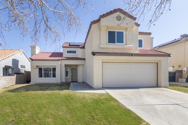 mediterranean / spanish-style home featuring a garage, a front lawn, and solar panels