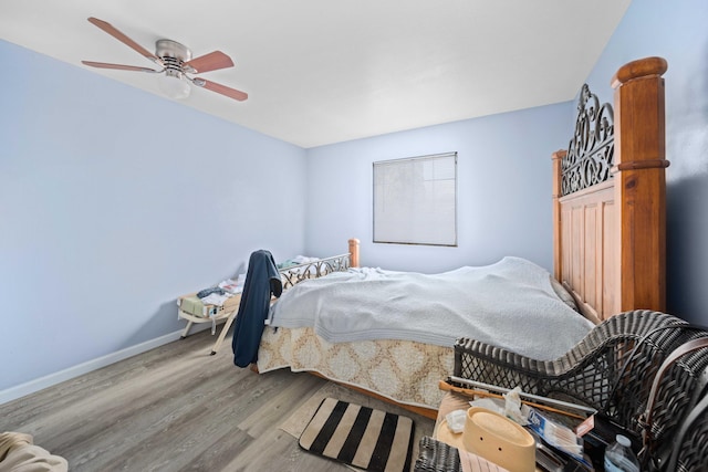 15872 Rexroth St, Mojave, CA 93501 - bedroom featuring wood finished floors, baseboards, and ceiling fan