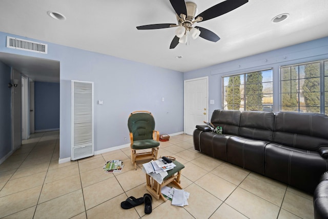 15872 Rexroth St, Mojave, CA 93501 - living room with a heating unit, baseboards, a ceiling fan, light tile patterned flooring, and recessed lighting