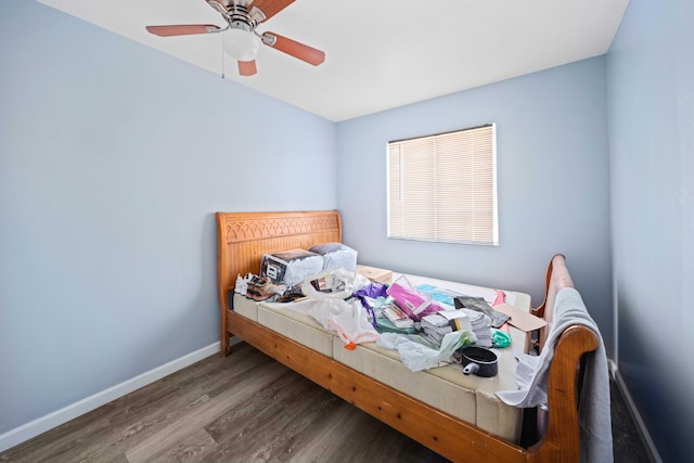 15872 Rexroth St, Mojave, CA 93501 - bedroom with wood finished floors, baseboards, and a ceiling fan
