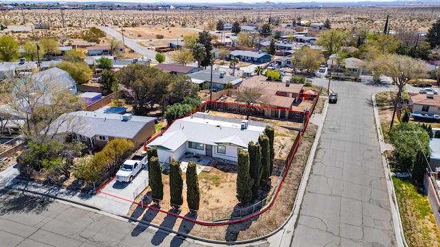 15872 Rexroth St, Mojave, CA 93501 - aerial perspective of suburban area featuring a mountain backdrop and a desert landscape