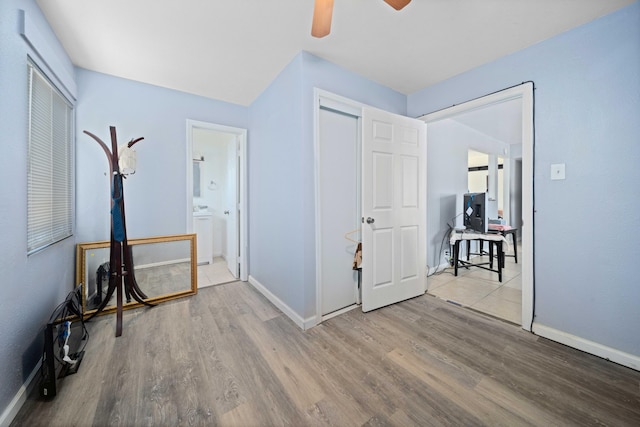 15872 Rexroth St, Mojave, CA 93501 - bedroom featuring wood finished floors, baseboards, a desk, and ensuite bath